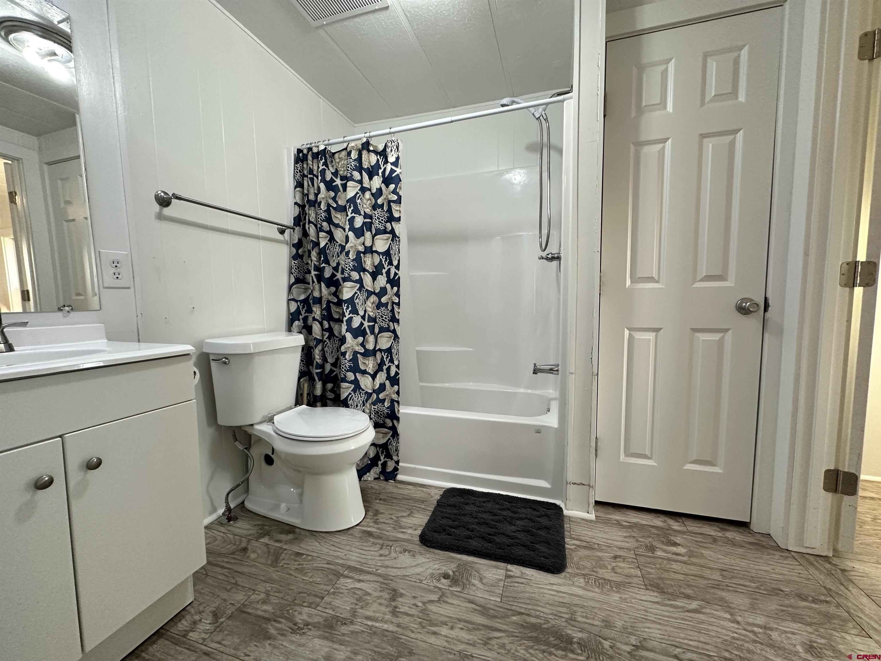 468 Rio Grande Road South Fork, CO 81154 - Photo 30 of 43 a bathroom with a toilet a sink and a bathtub