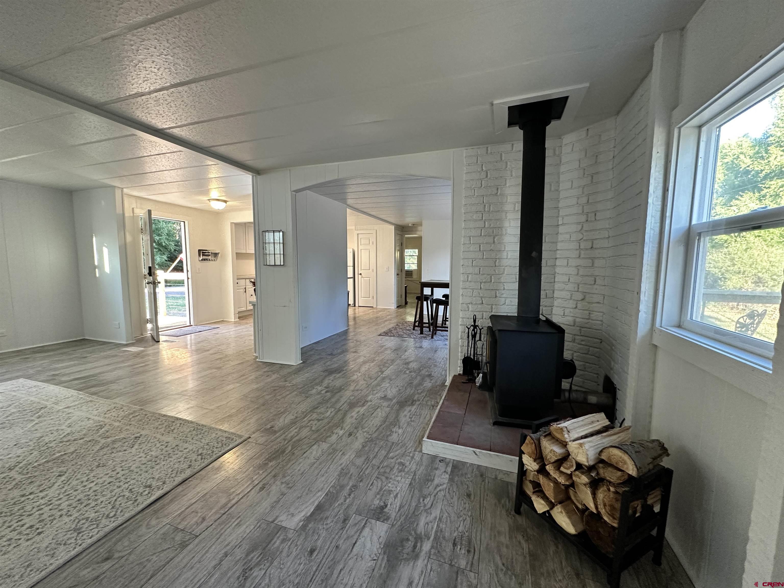 468 Rio Grande Road South Fork, CO 81154 - Photo 32 of 43 a living room with furniture and a window