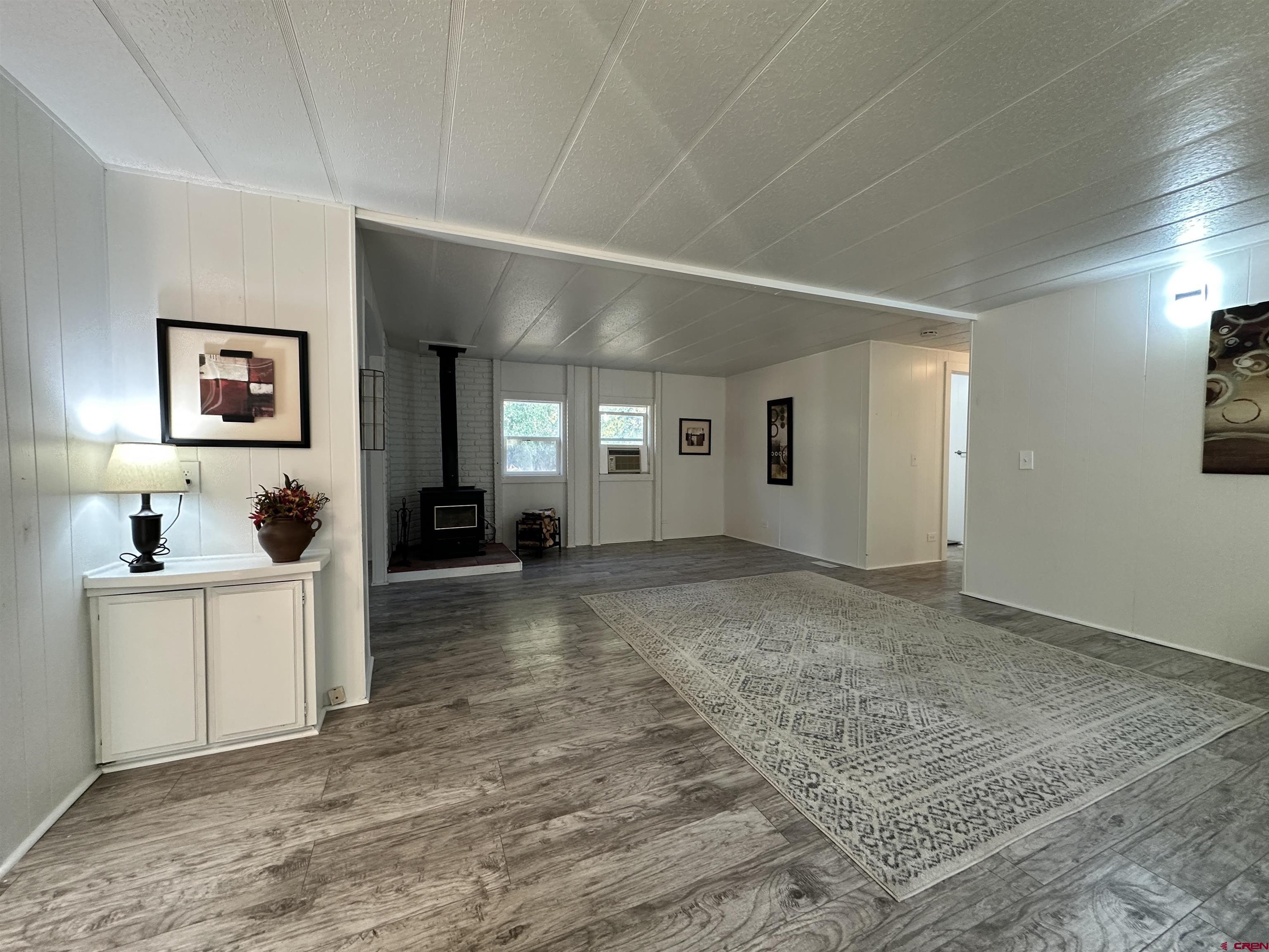 468 Rio Grande Road South Fork, CO 81154 - Photo 8 of 43 a view of a kitchen with furniture and window