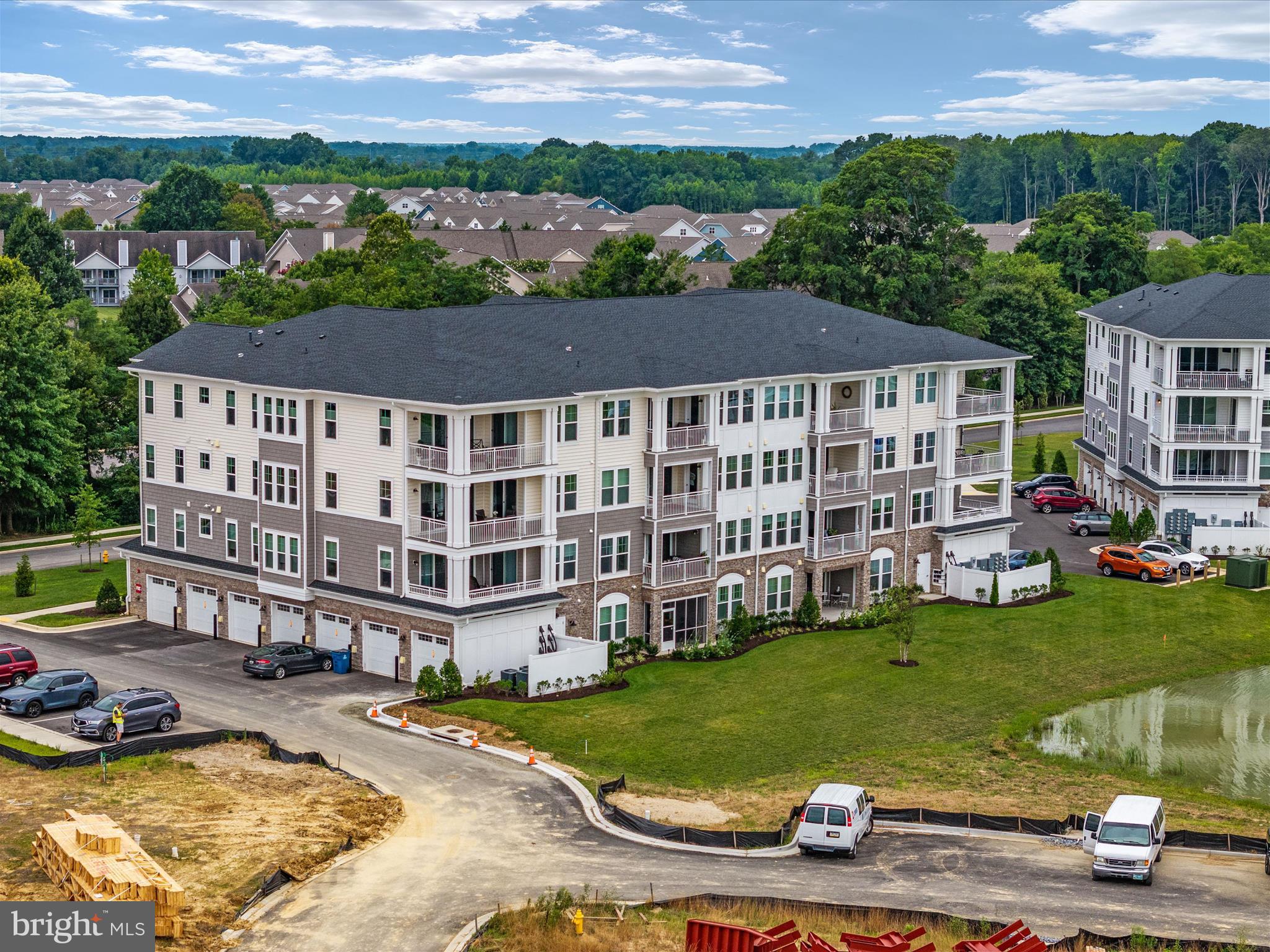 141 Switchgrass Way, Unit 34 Chester, MD 21619 - Photo 59 of 61 a view of a house with pool porch and sitting area