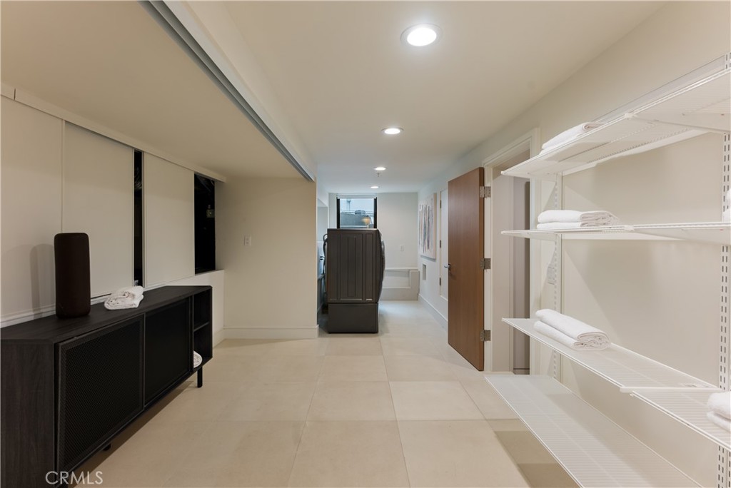 21656 Las Flores Heights Road Malibu, CA 90265 - Photo 45 of 71 Large downstairs laundry area with a walkin in closet
