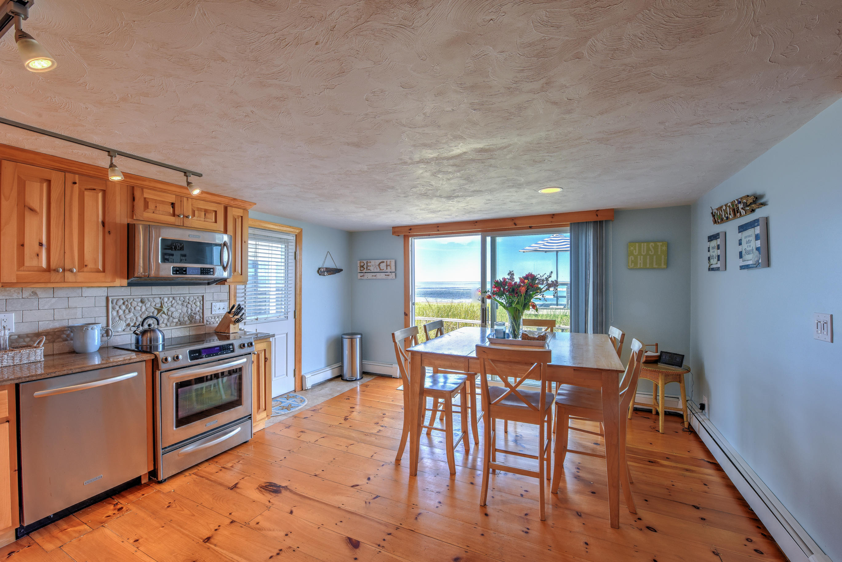 215 Phillips Road Sandwich, MA 02563 - Photo 10 of 26 a dining room with furniture and window