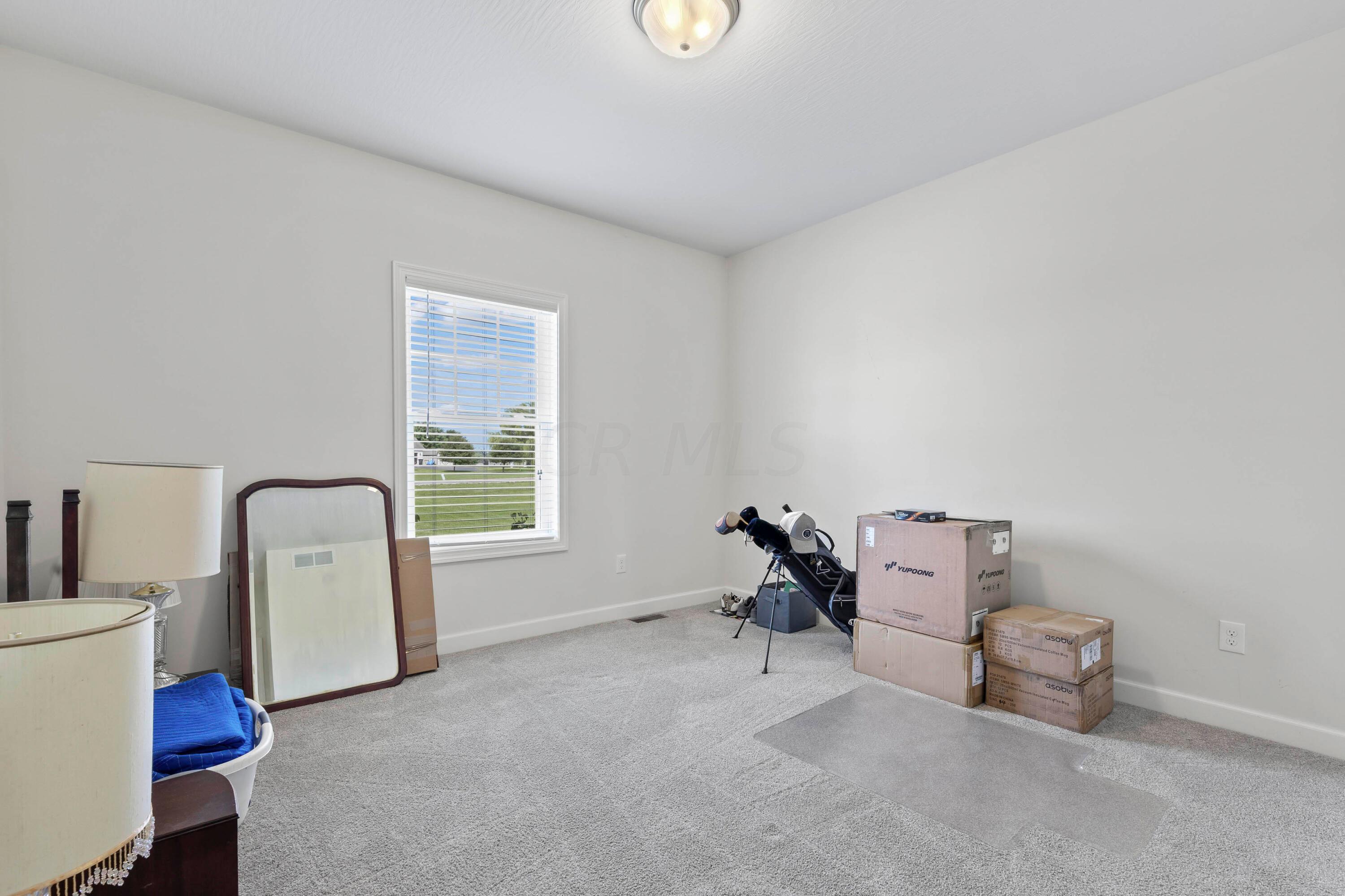 3644 Panhandle Road Delaware, OH 43015 - Photo 5 of 46 • Light grey carpet
• Ivory painted walls
• Ceiling light
• Closet with double sliding
doors
• 2” blinds