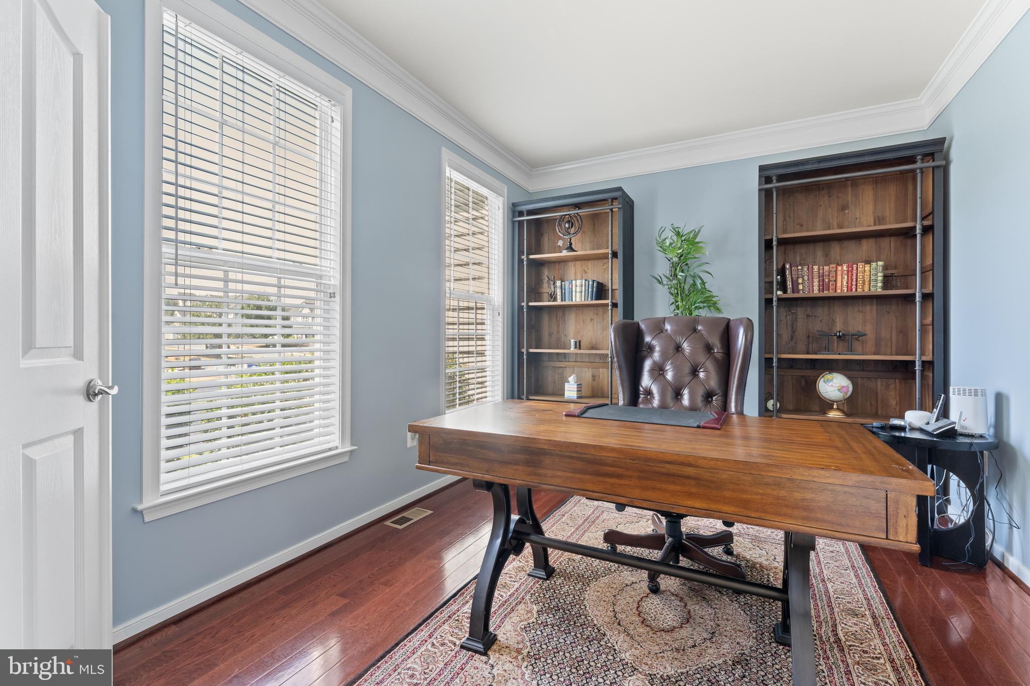 16 Barley Mill Court Stafford, VA 22554 - Photo 19 of 48 a view of a workspace with furniture and a bookshelf