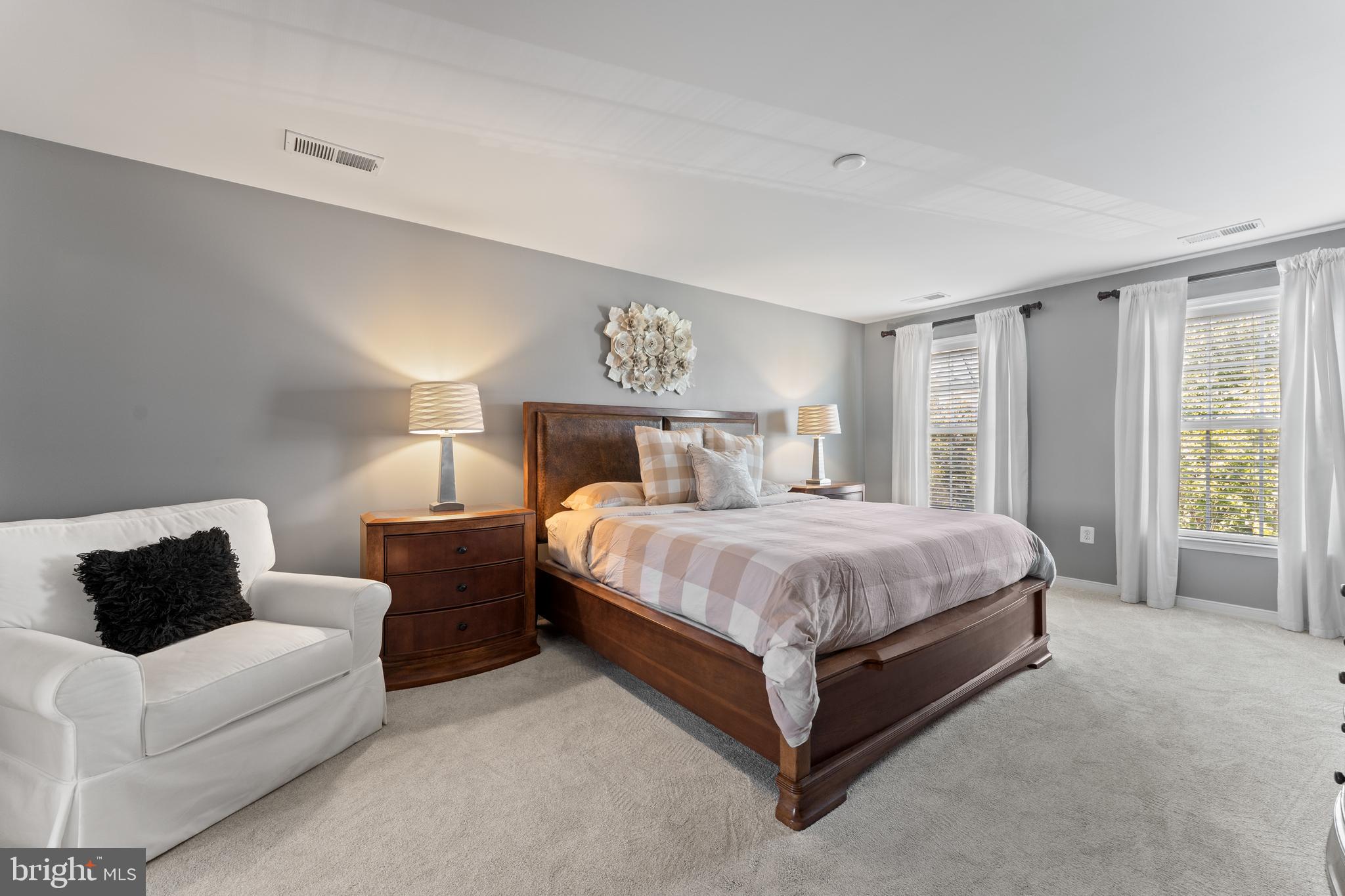 16 Barley Mill Court Stafford, VA 22554 - Photo 22 of 48 a spacious bedroom with a bed and a couch