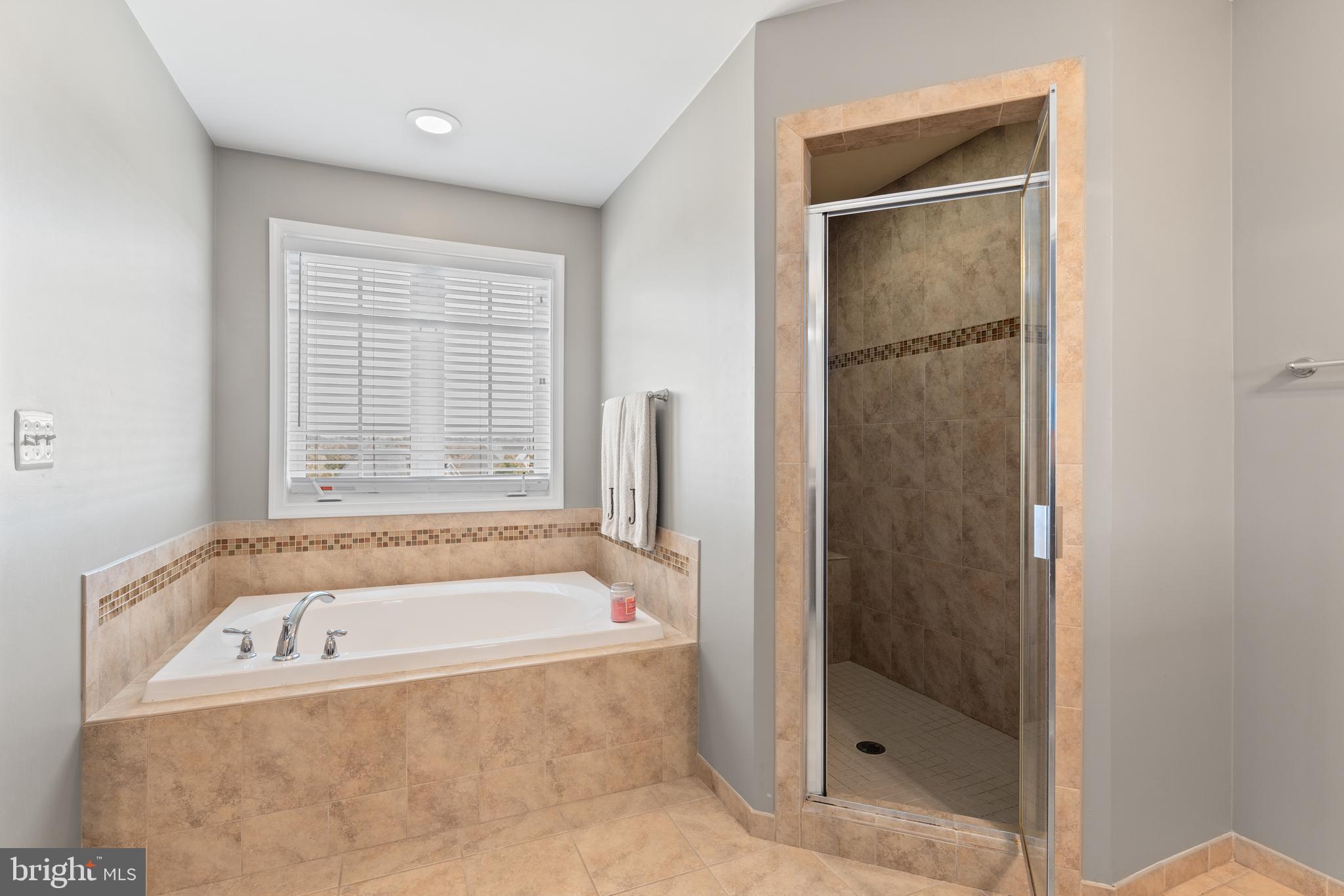 16 Barley Mill Court Stafford, VA 22554 - Photo 26 of 48 a white bath tub sitting next to a shower