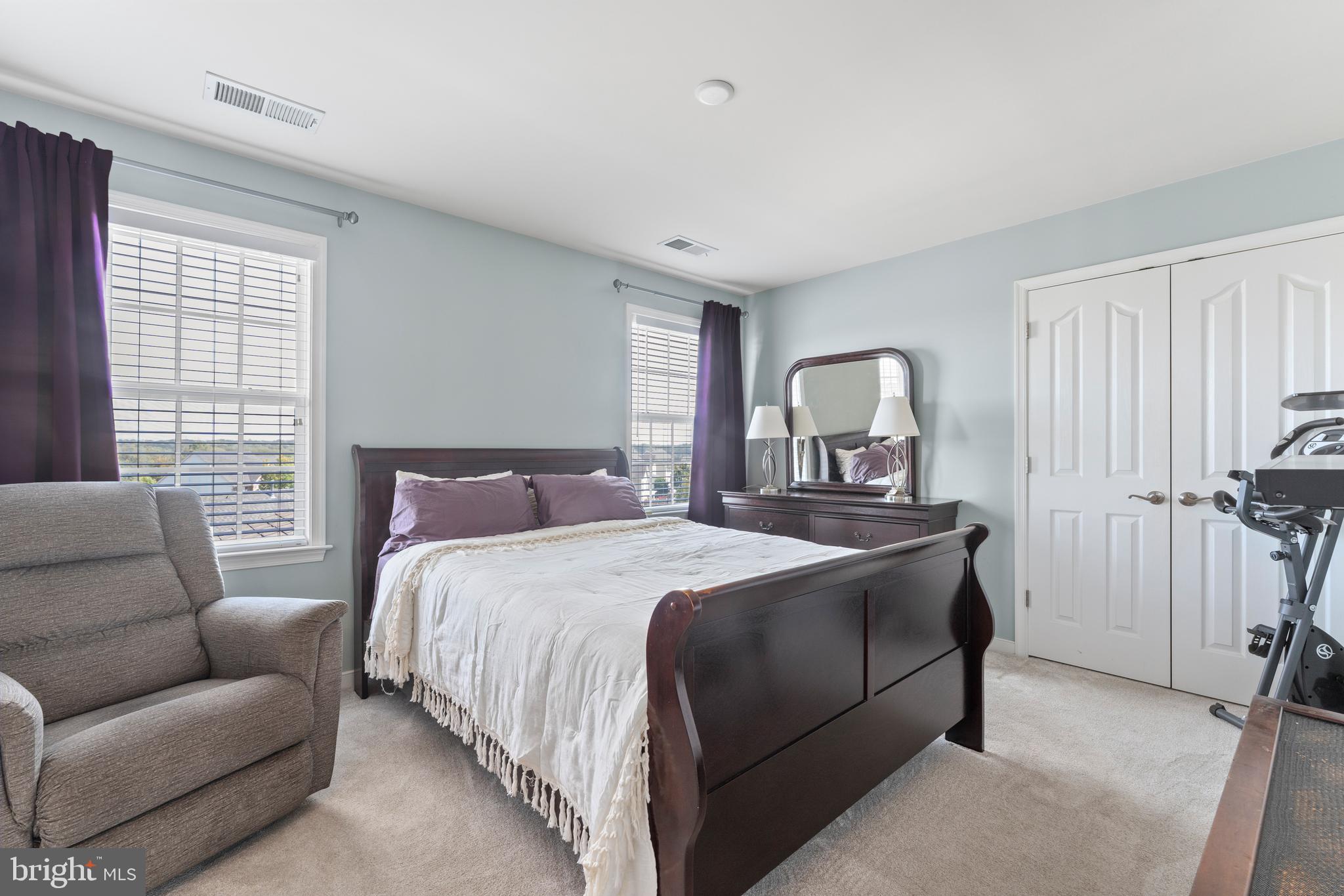 16 Barley Mill Court Stafford, VA 22554 - Photo 31 of 48 a bedroom with a bed mirror and window