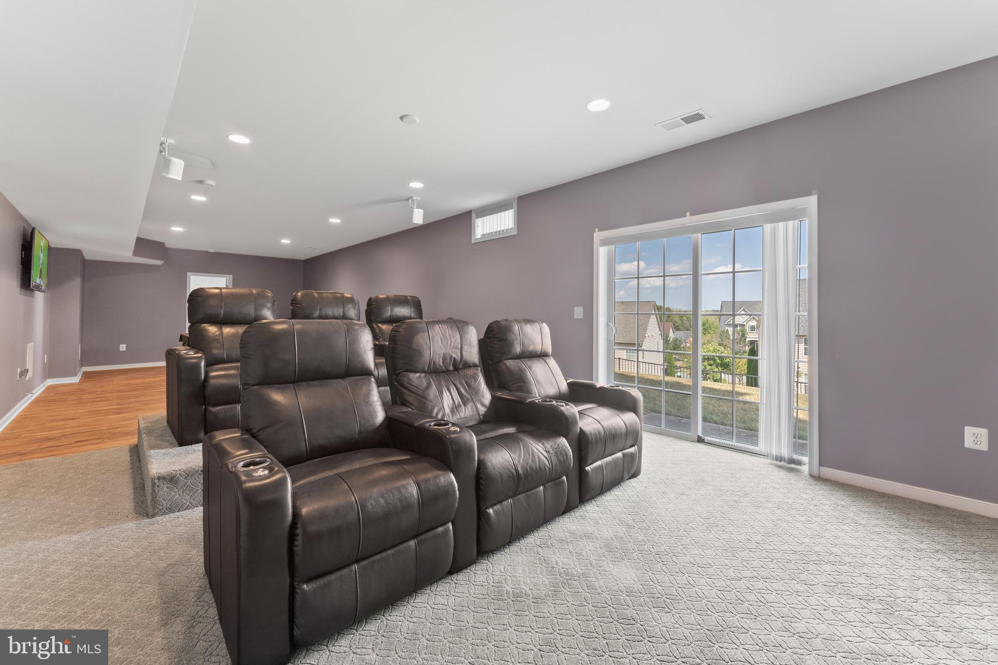 16 Barley Mill Court Stafford, VA 22554 - Photo 41 of 48 a media room with lots of chairs and a projector screen