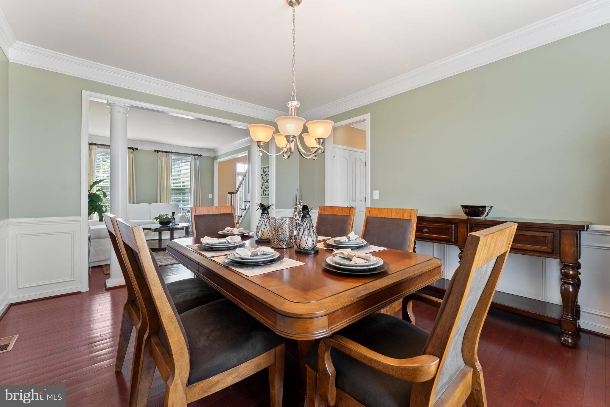 16 Barley Mill Court Stafford, VA 22554 - Photo 6 of 48 a view of a dining room with furniture wooden floor and chandelier