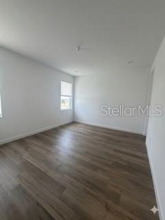3495 Harborside Avenue Fort Pierce, FL 34946 - Photo 13 of 15 a view of wooden floor and windows in a room