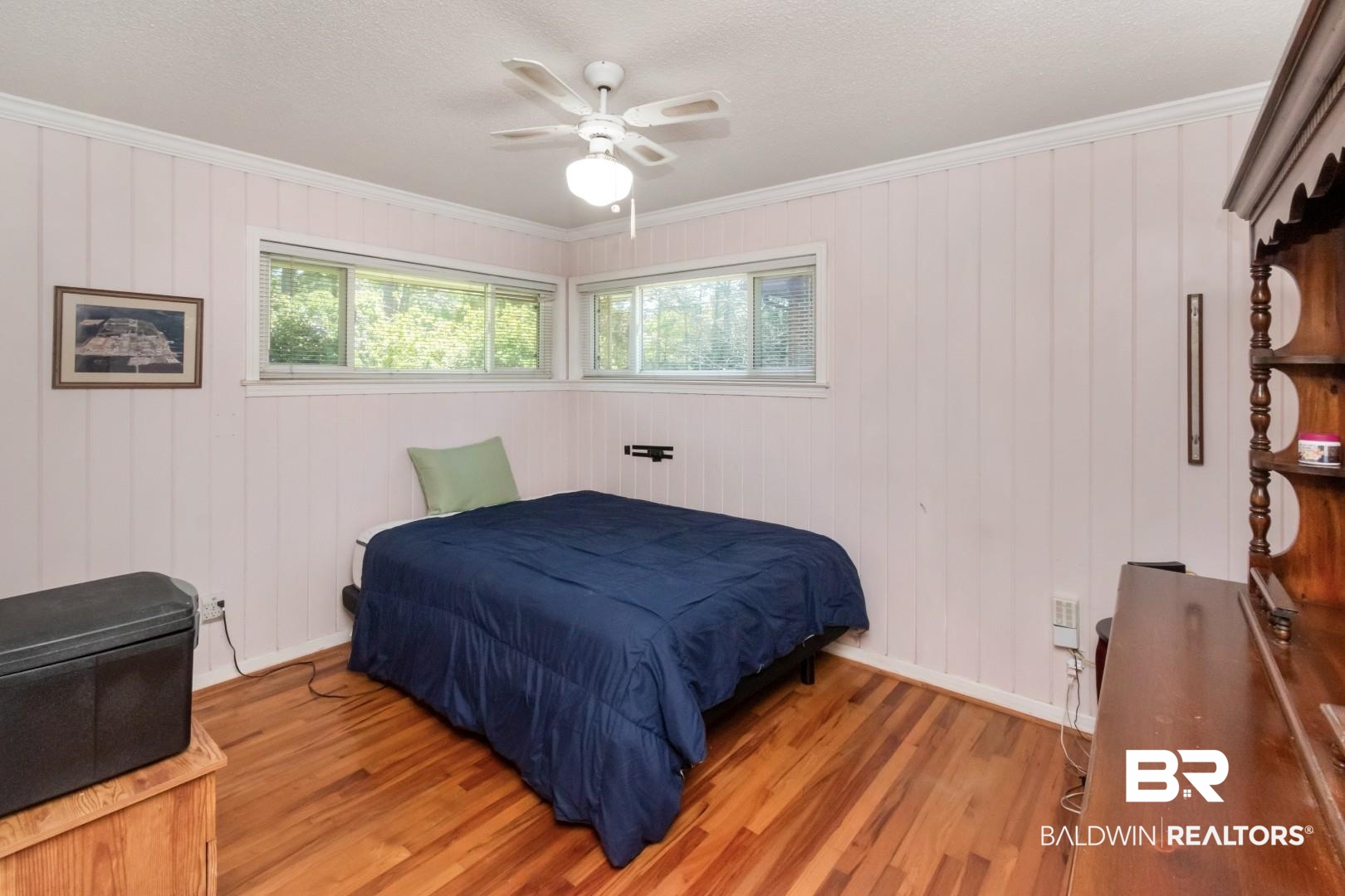 6300 Woodcrest Drive Mobile, AL 36608 - Photo 16 of 35 Bedroom featuring light wood-style flooring, crown molding, baseboards, and a ceiling fan