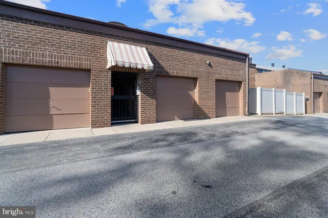 a front view of a house with a garage