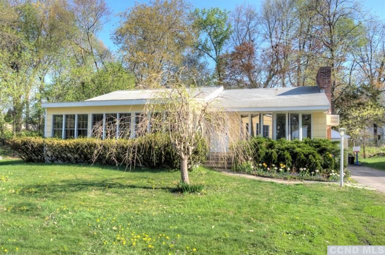 1047 Lakeview Road Copake, NY 12516 - Photo 2 of 10 a front view of a house with a yard