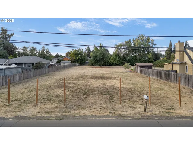 a black and white photo of a field