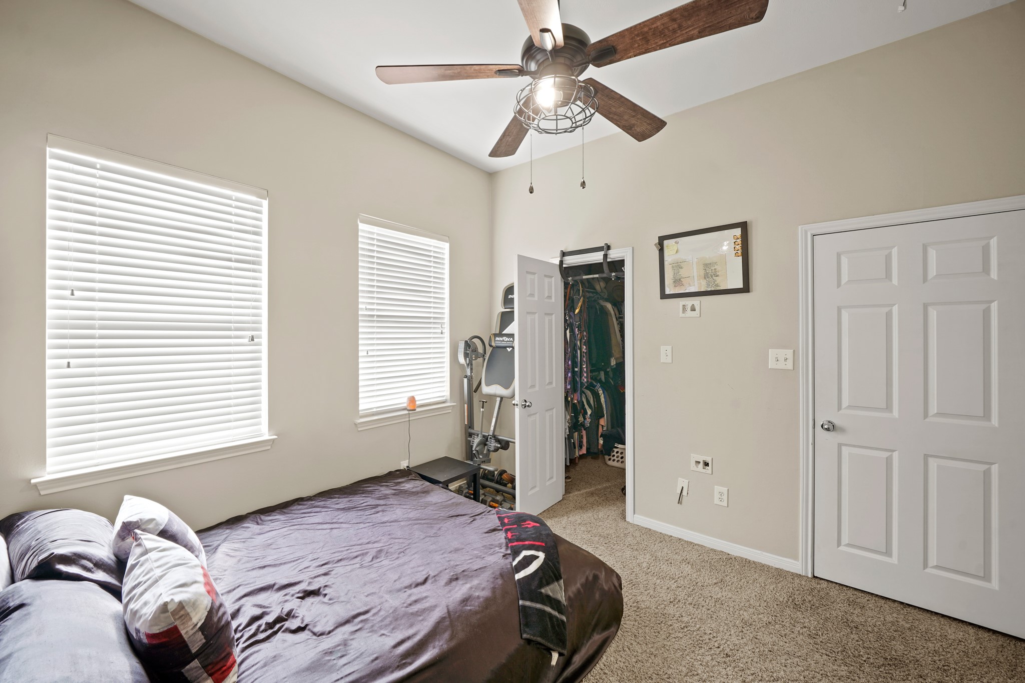 2605 West Dallas Street Houston, TX 77019 - Photo 22 of 29 a bedroom with a bed and a window