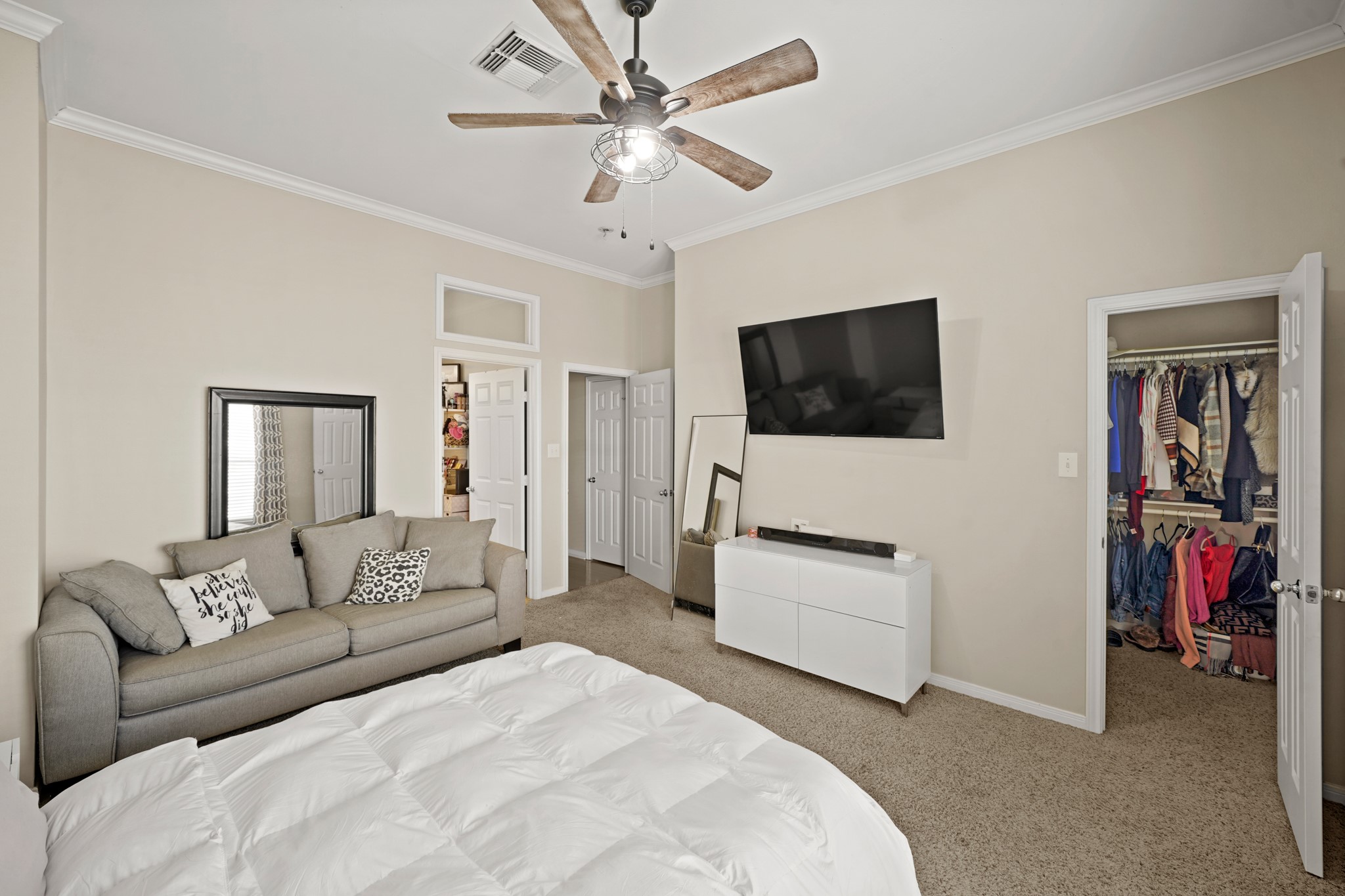 2605 West Dallas Street Houston, TX 77019 - Photo 25 of 29 a bedroom with a bed and a flat screen tv