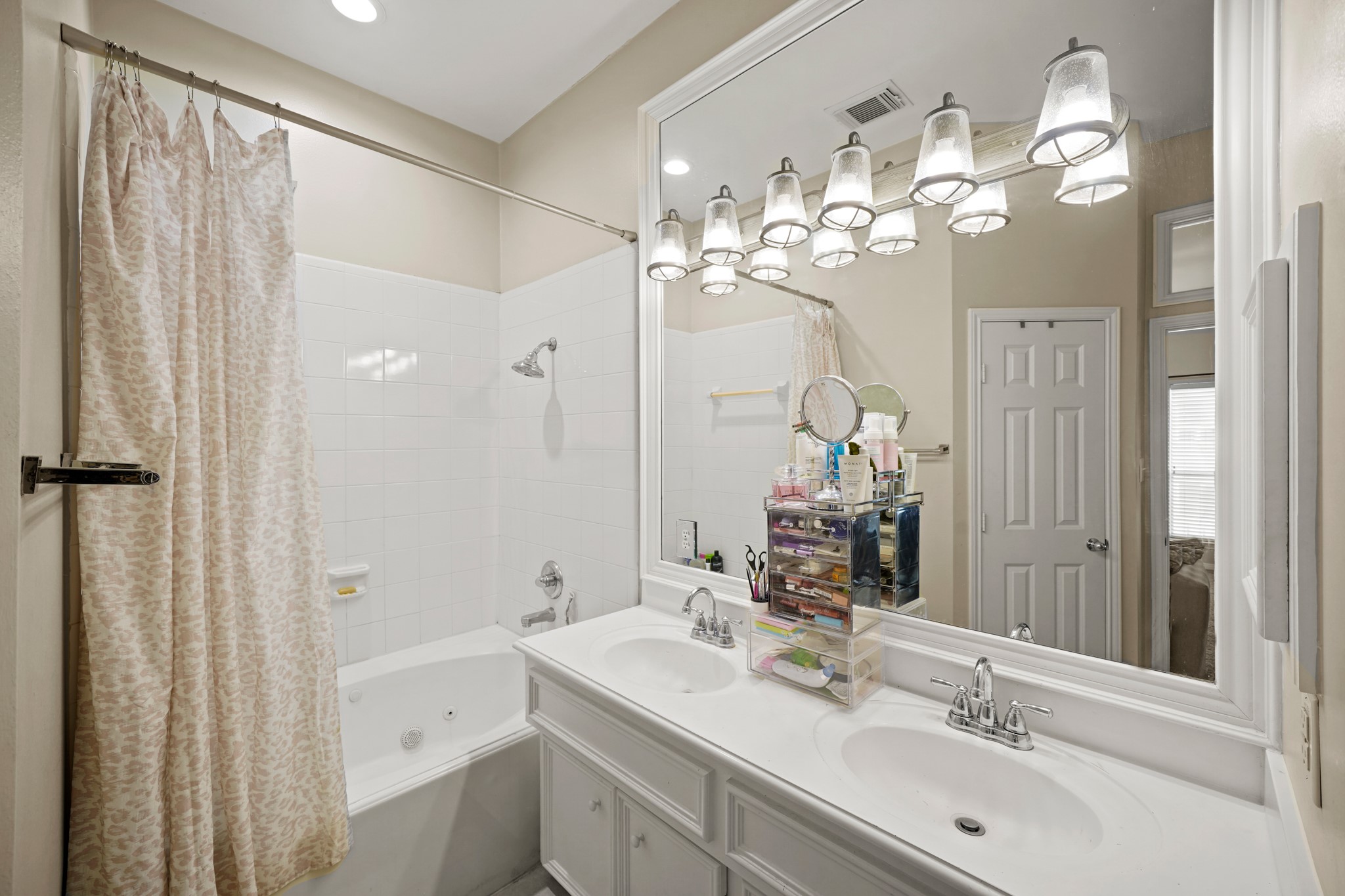 2605 West Dallas Street Houston, TX 77019 - Photo 28 of 29 a bathroom with a double vanity sink mirror and shower