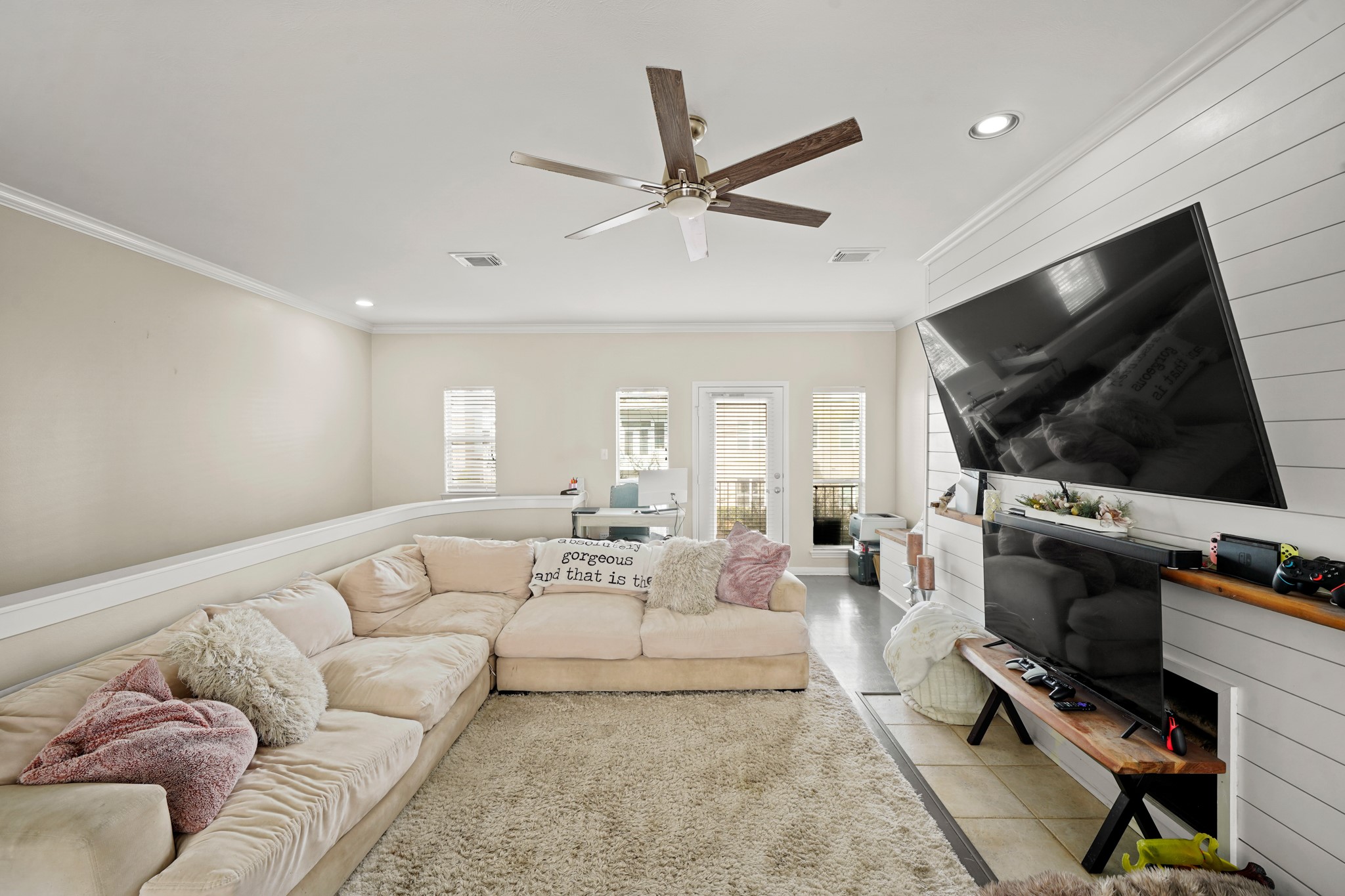 2605 West Dallas Street Houston, TX 77019 - Photo 6 of 29 a living room with furniture and a flat screen tv