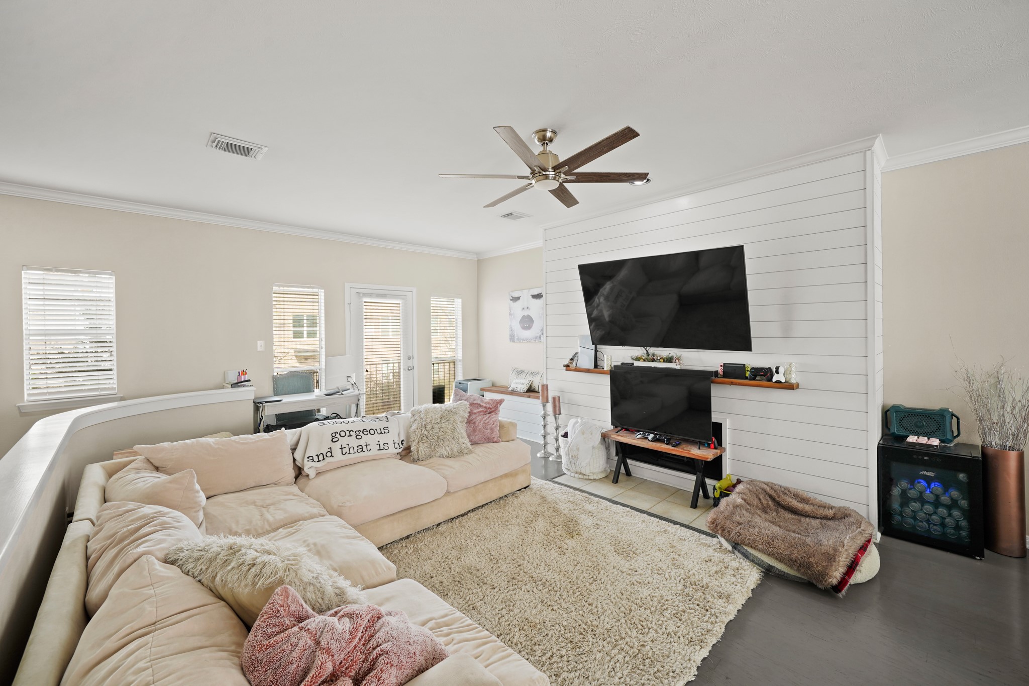 2605 West Dallas Street Houston, TX 77019 - Photo 7 of 29 a living room with furniture and a flat screen tv
