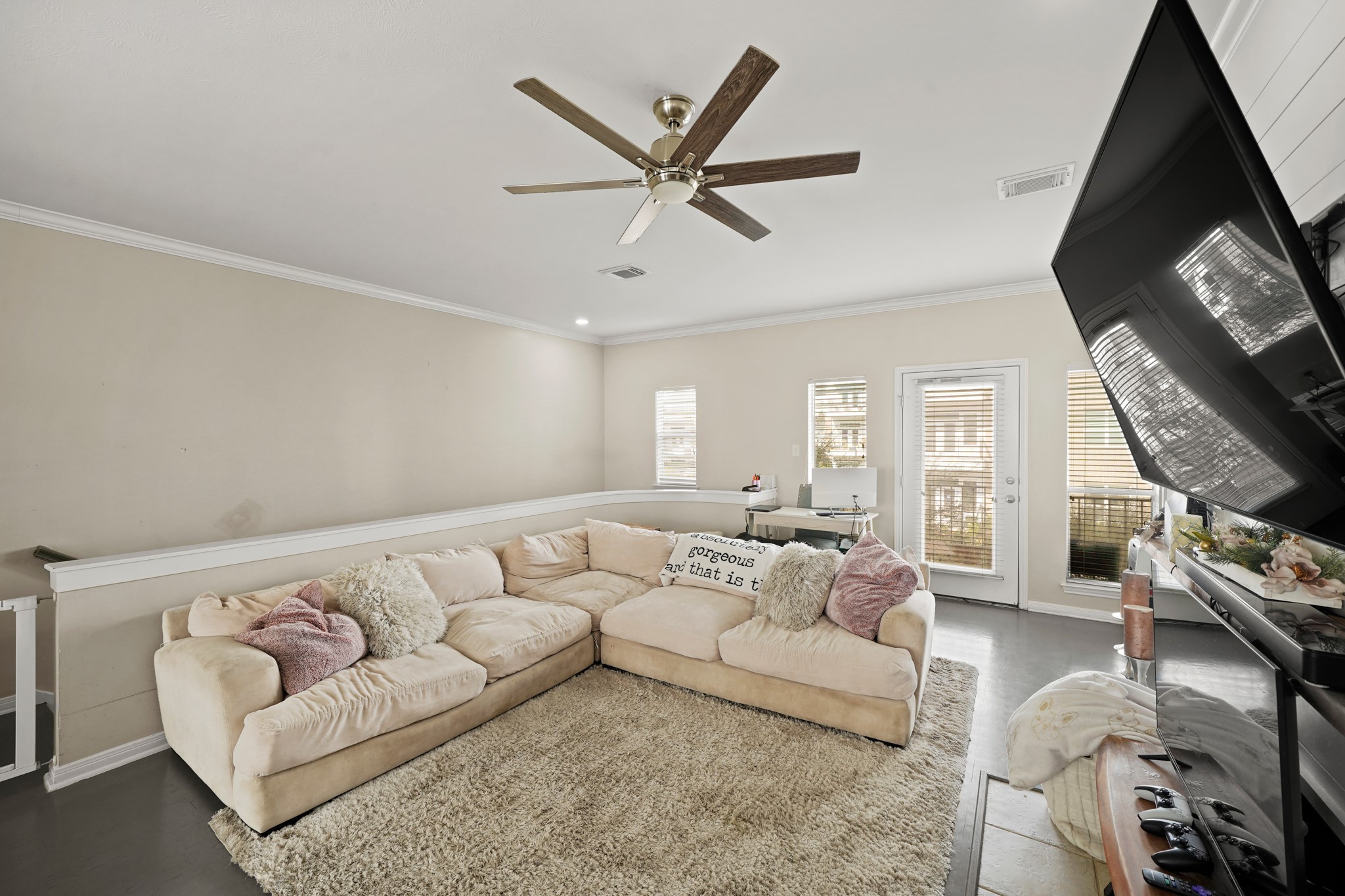 2605 West Dallas Street Houston, TX 77019 - Photo 8 of 29 a living room with furniture and a flat screen tv