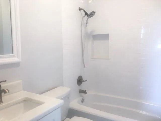 a bathroom with a sink and a bathtub