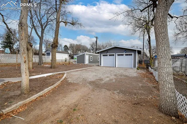 a house with trees in front of it