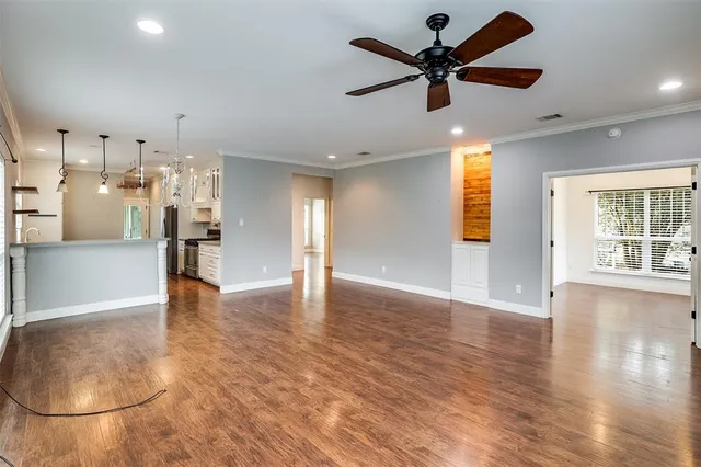 a view of an empty room and window