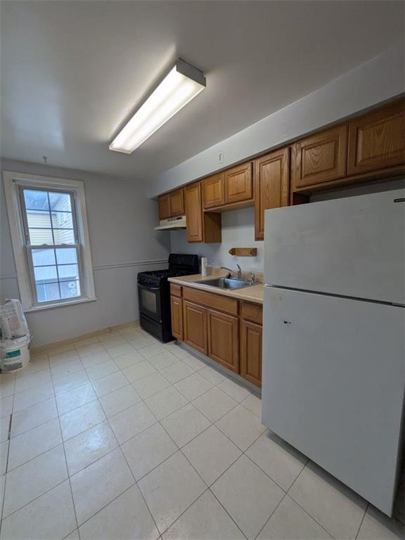 725 Chartiers Street, Unit 2 Bridgeville, PA 15017 - Photo 16 of 19 a kitchen with a cabinets and refrigerator