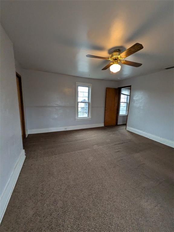 725 Chartiers Street, Unit 2 Bridgeville, PA 15017 - Photo 7 of 19 a view of a livingroom with a ceiling fan and window