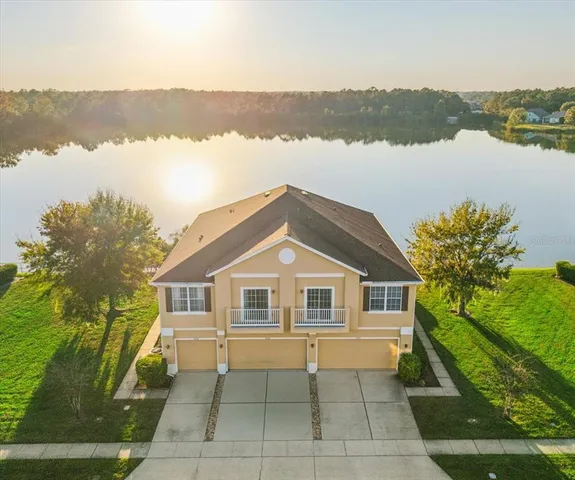 a house view with a lake view