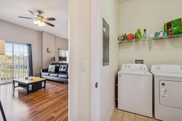a living room with furniture and a table
