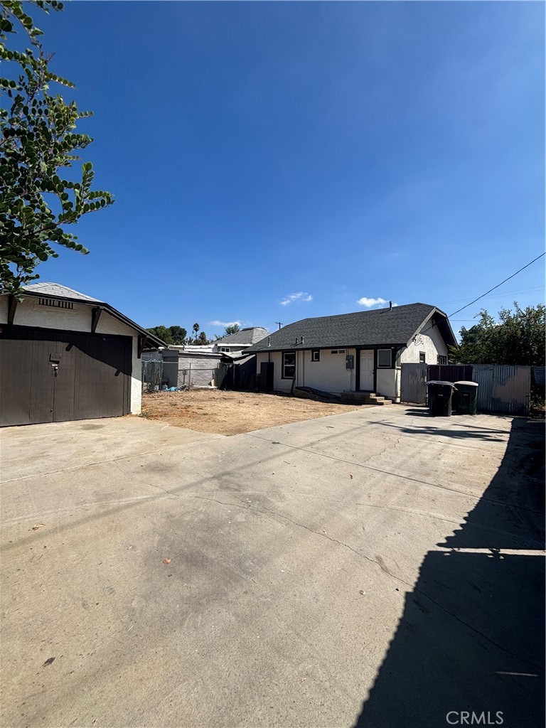 4793 Grove Riverside Ca Riverside, CA 92507 - Photo 16 of 23 a view of a big yard with an outdoor space