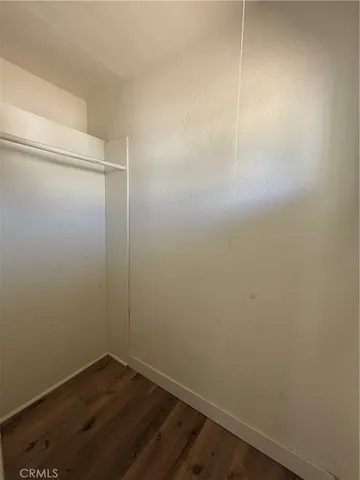 a view of small space with wooden floor