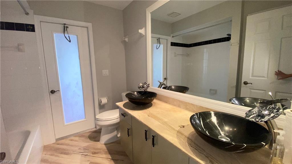 71 Heritage Way Naples, FL 34110 - Photo 25 of 29 Guest Bath