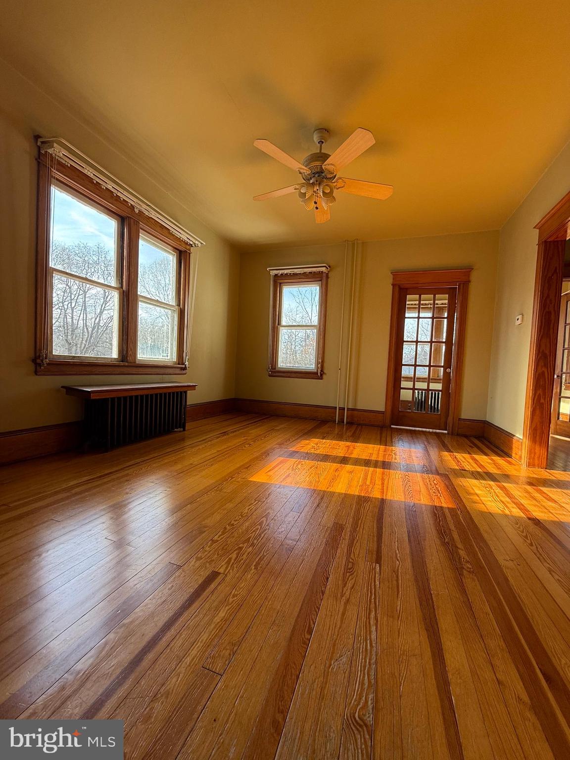 8340 Interchange Road Lehighton, PA 18235 - Photo 51 of 87 a view of an empty room with wooden floor and a window
