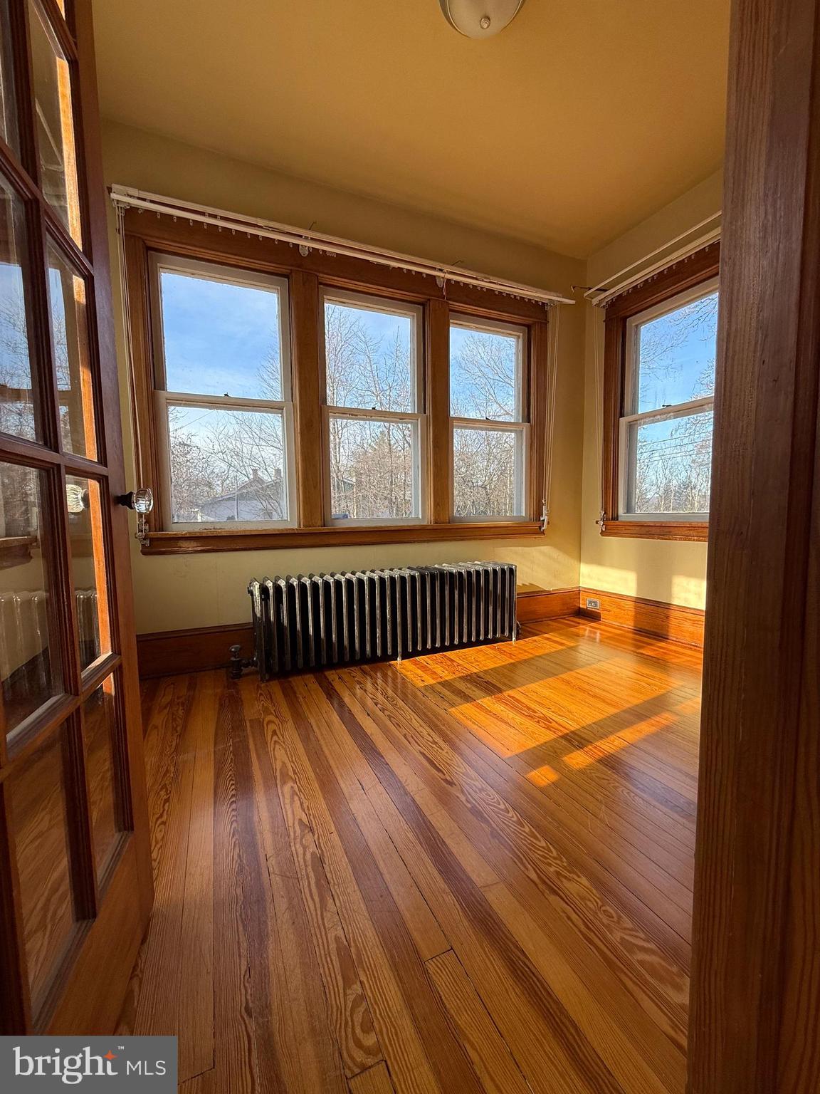8340 Interchange Road Lehighton, PA 18235 - Photo 53 of 87 a view of an empty room with wooden floor and a window