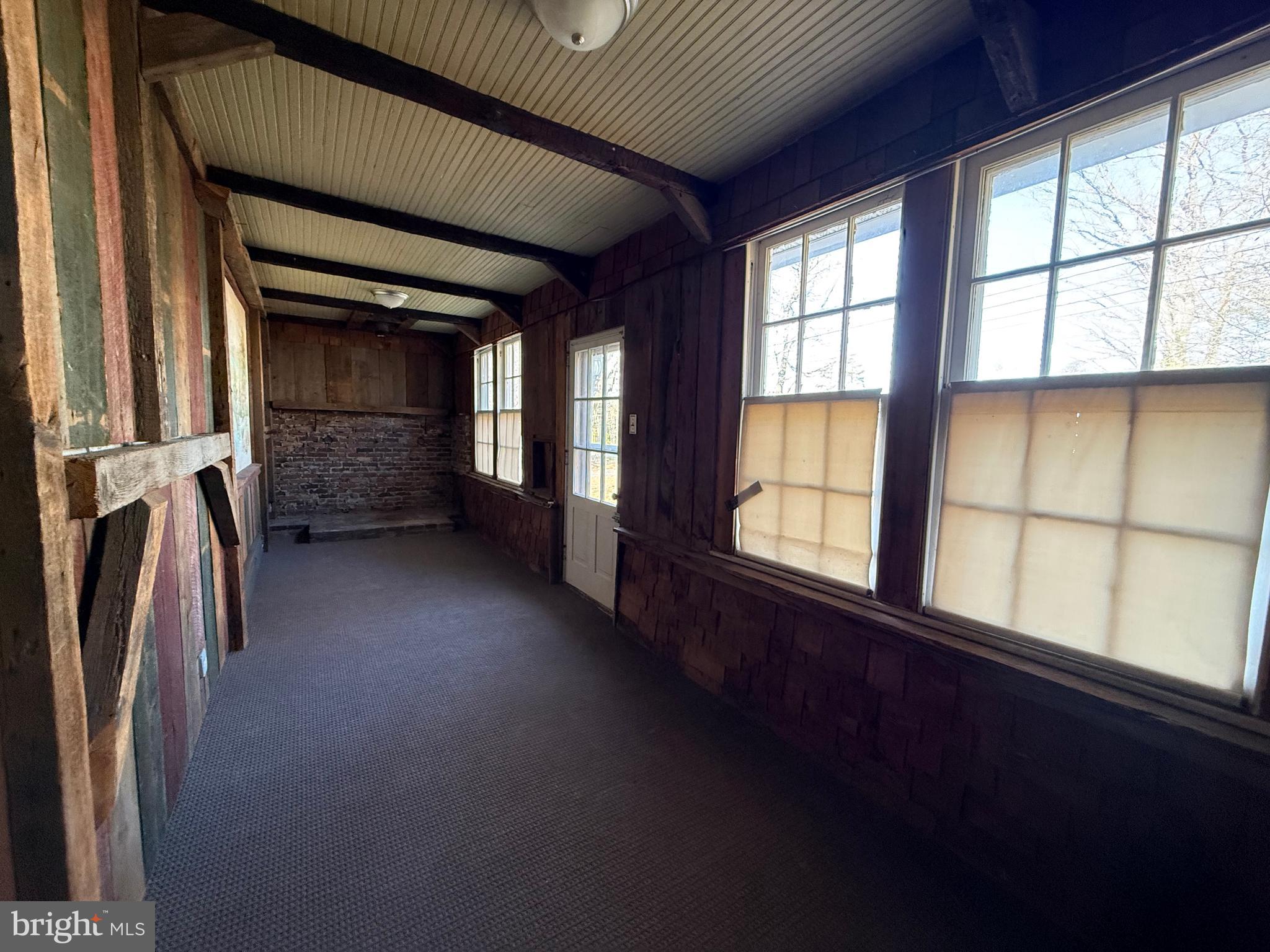 8340 Interchange Road Lehighton, PA 18235 - Photo 61 of 87 a view of hallway with stairs and wooden floor