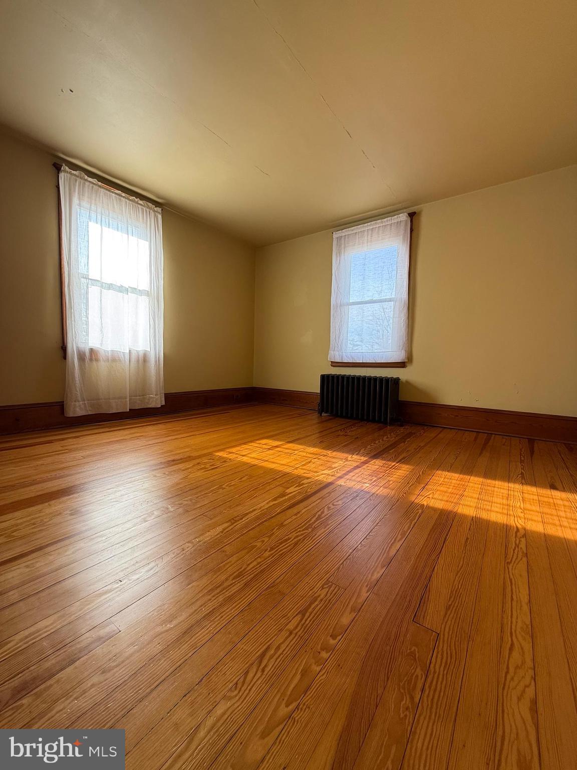 8340 Interchange Road Lehighton, PA 18235 - Photo 75 of 87 an empty room with wooden floor and windows