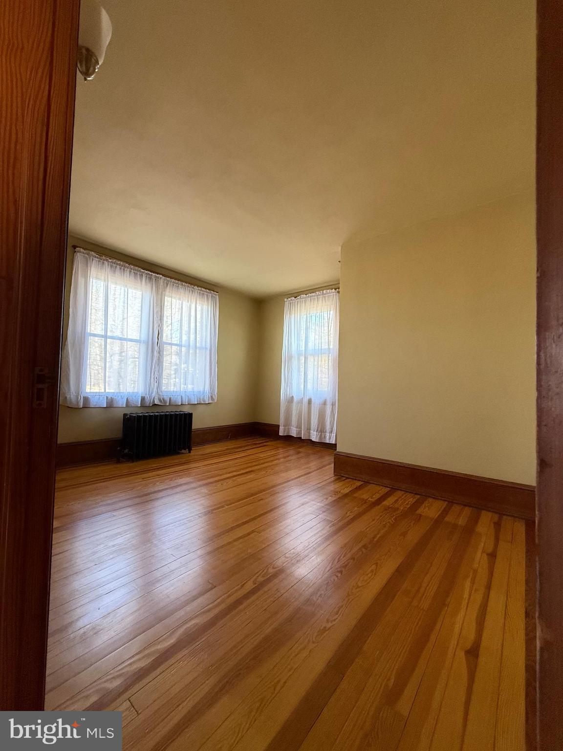 8340 Interchange Road Lehighton, PA 18235 - Photo 77 of 87 a view of empty room with wooden floor and fan