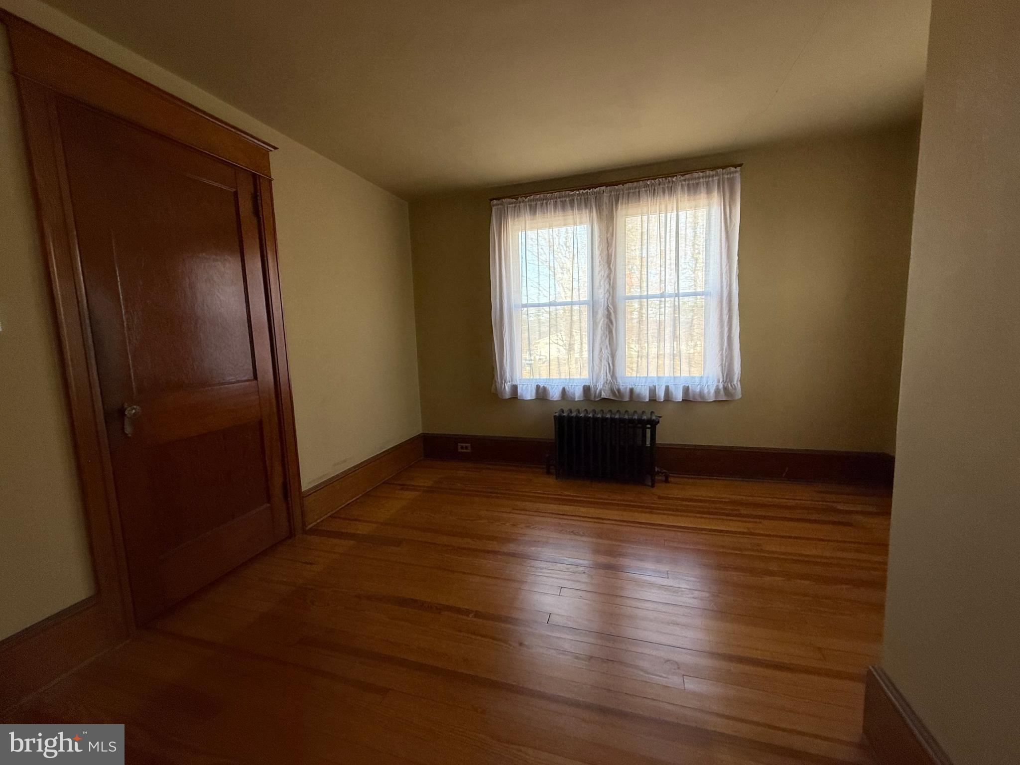 8340 Interchange Road Lehighton, PA 18235 - Photo 78 of 87 an empty room with wooden floor and windows
