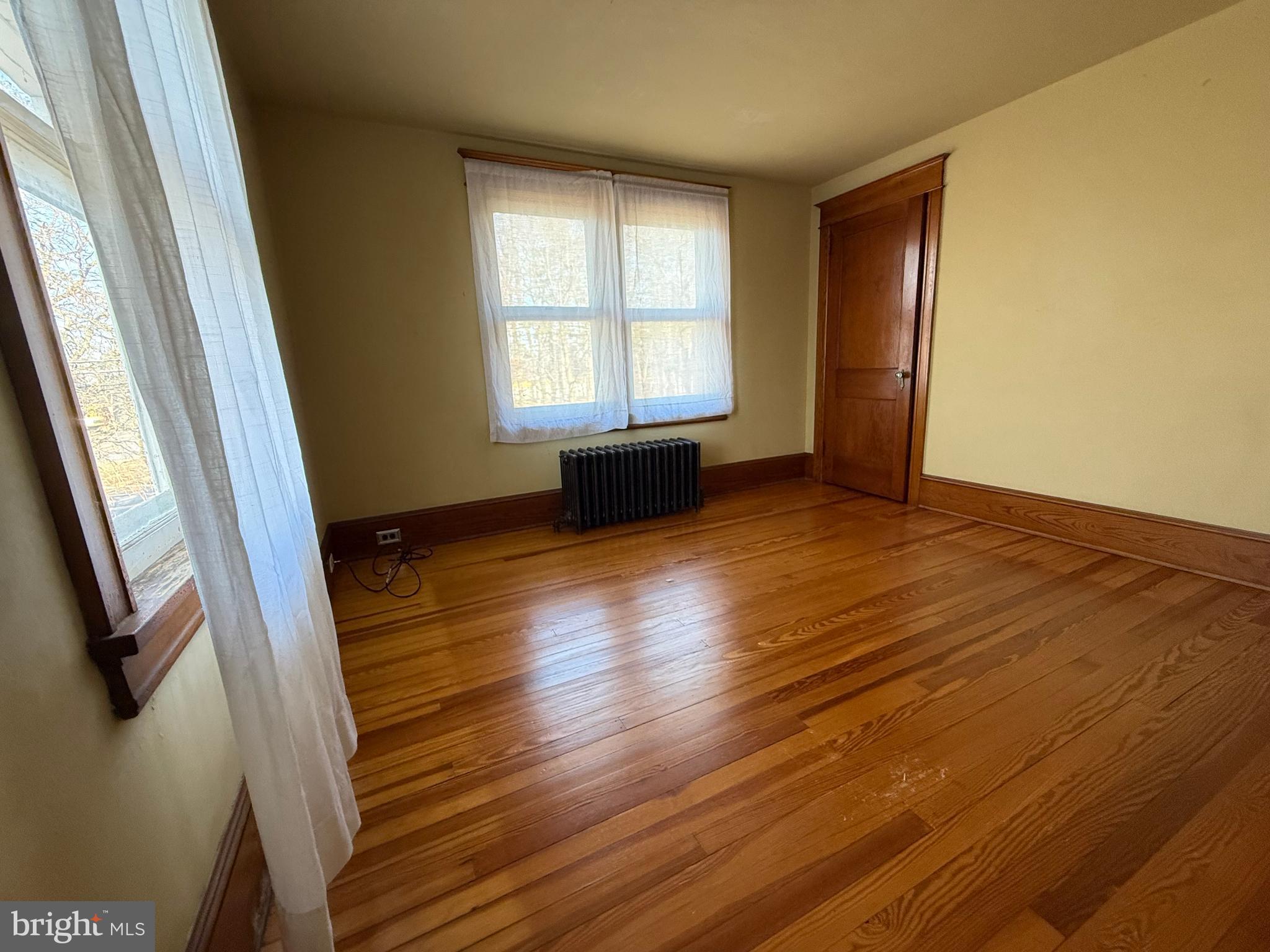 8340 Interchange Road Lehighton, PA 18235 - Photo 80 of 87 a view of an empty room with wooden floor and a window