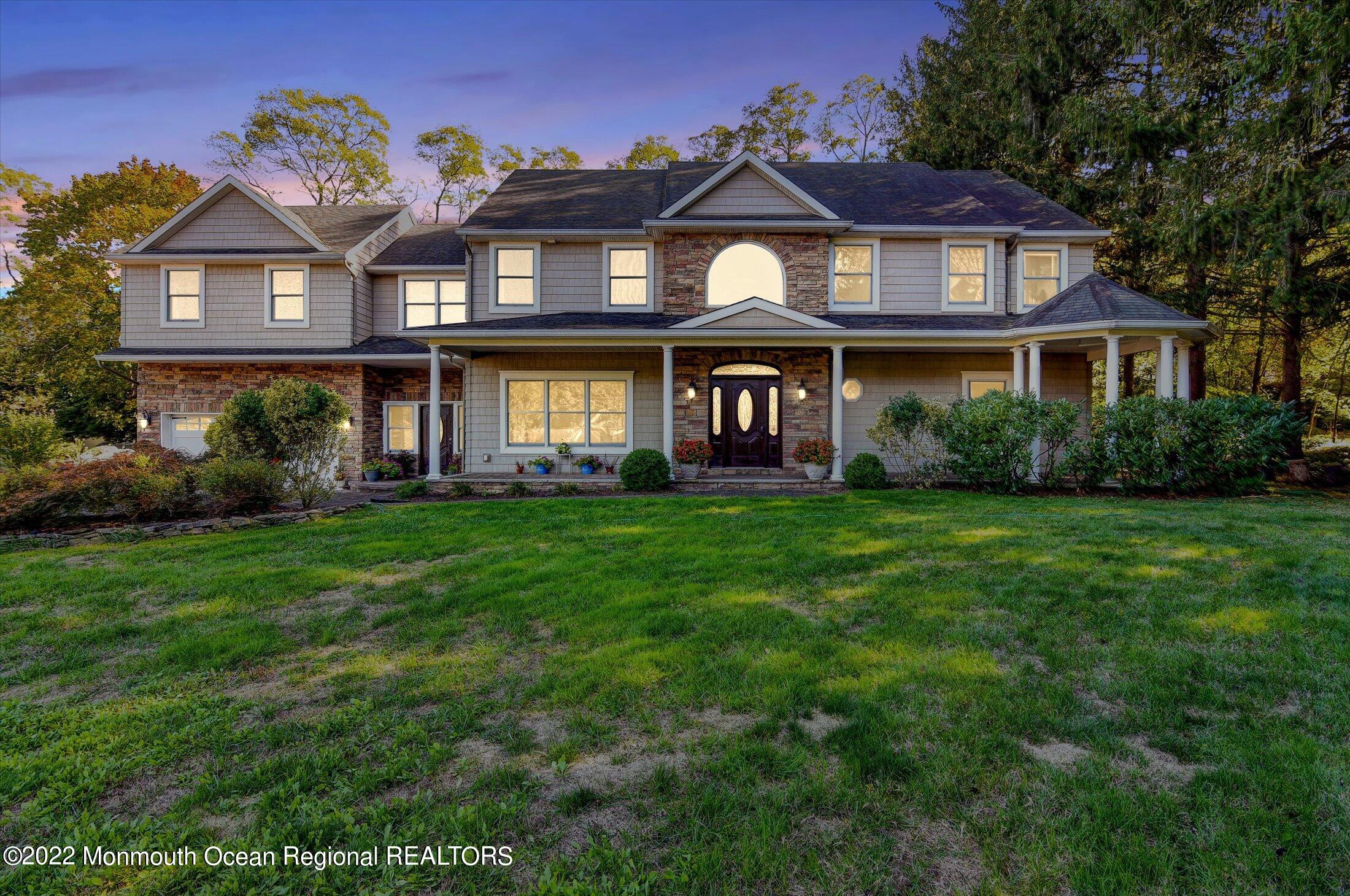 107 Tennent Road Morganville, NJ 07751 - Photo 3 of 41 03-Twilight Photo