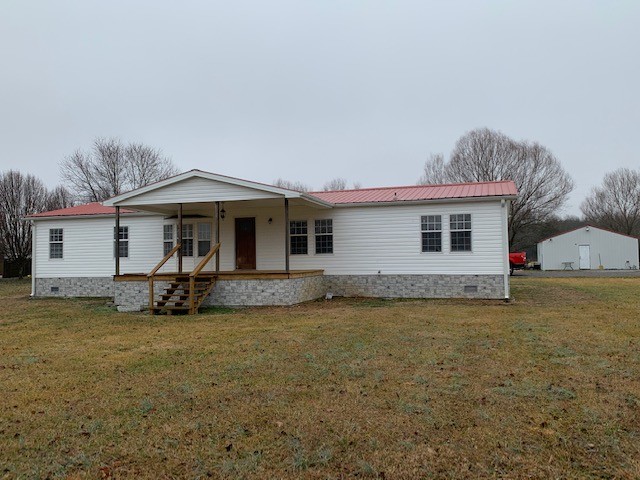 2132 Sagely Anderson Road Manchester, TN 37355 - Photo 1 of 14 a view of a house with a yard and sitting area