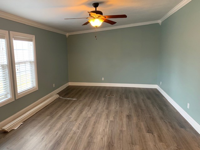 2132 Sagely Anderson Road Manchester, TN 37355 - Photo 7 of 14 a room with wooden floor and windows