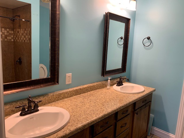 2132 Sagely Anderson Road Manchester, TN 37355 - Photo 10 of 14 a bathroom with a sink and a mirror