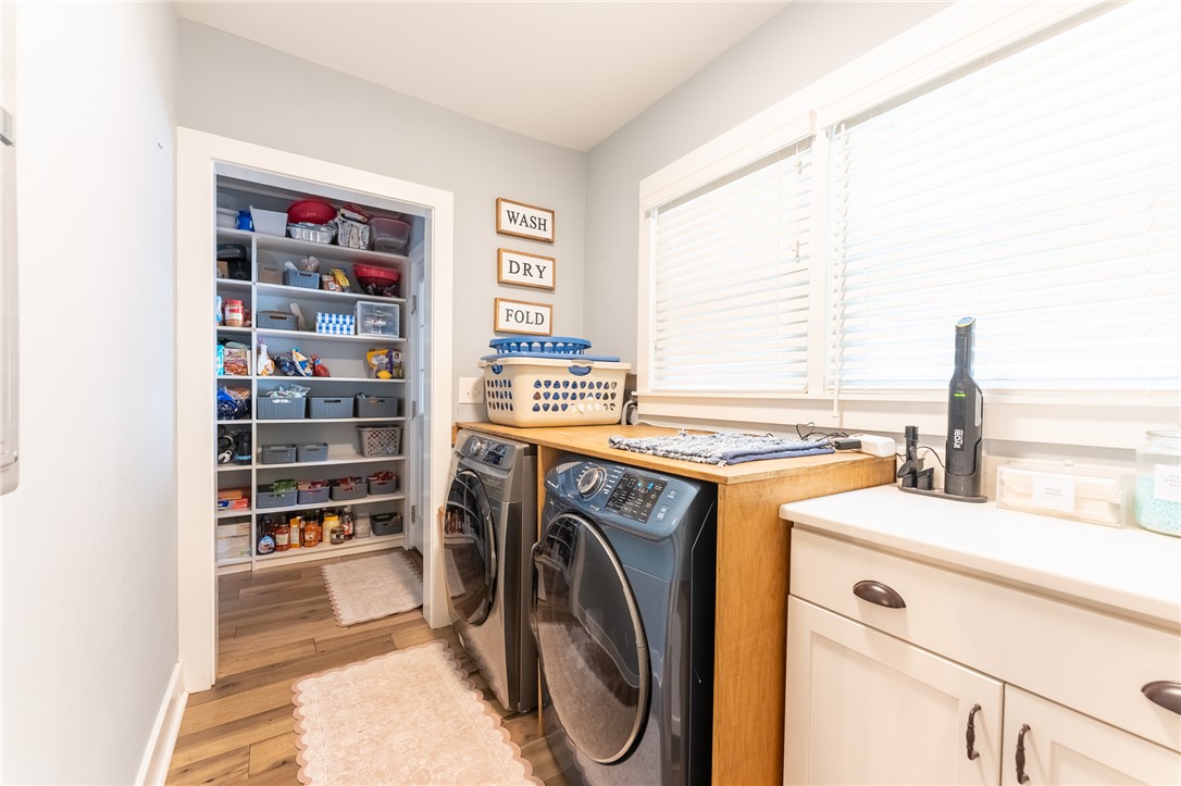 103 Riggs Drive Clemson, SC 29631 - Photo 11 of 50 Functional laundry room offers a generous pantry with ample storage, making chores efficient.