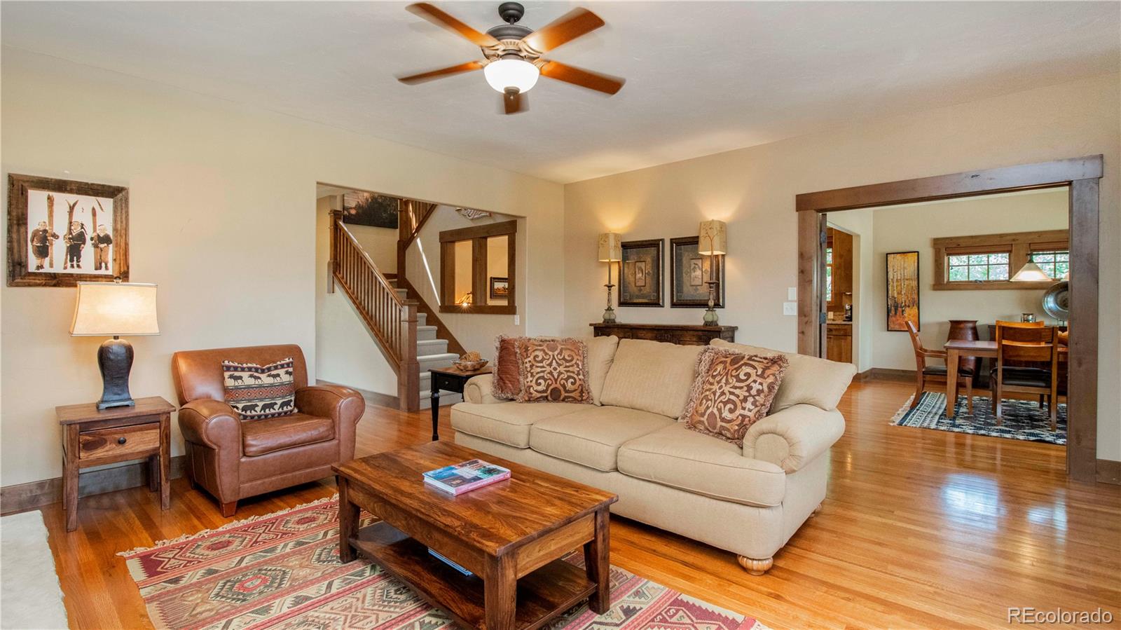 21 Meadow Trail Fraser, CO 80442 - Photo 12 of 36 a living room with furniture a ceiling fan and a window