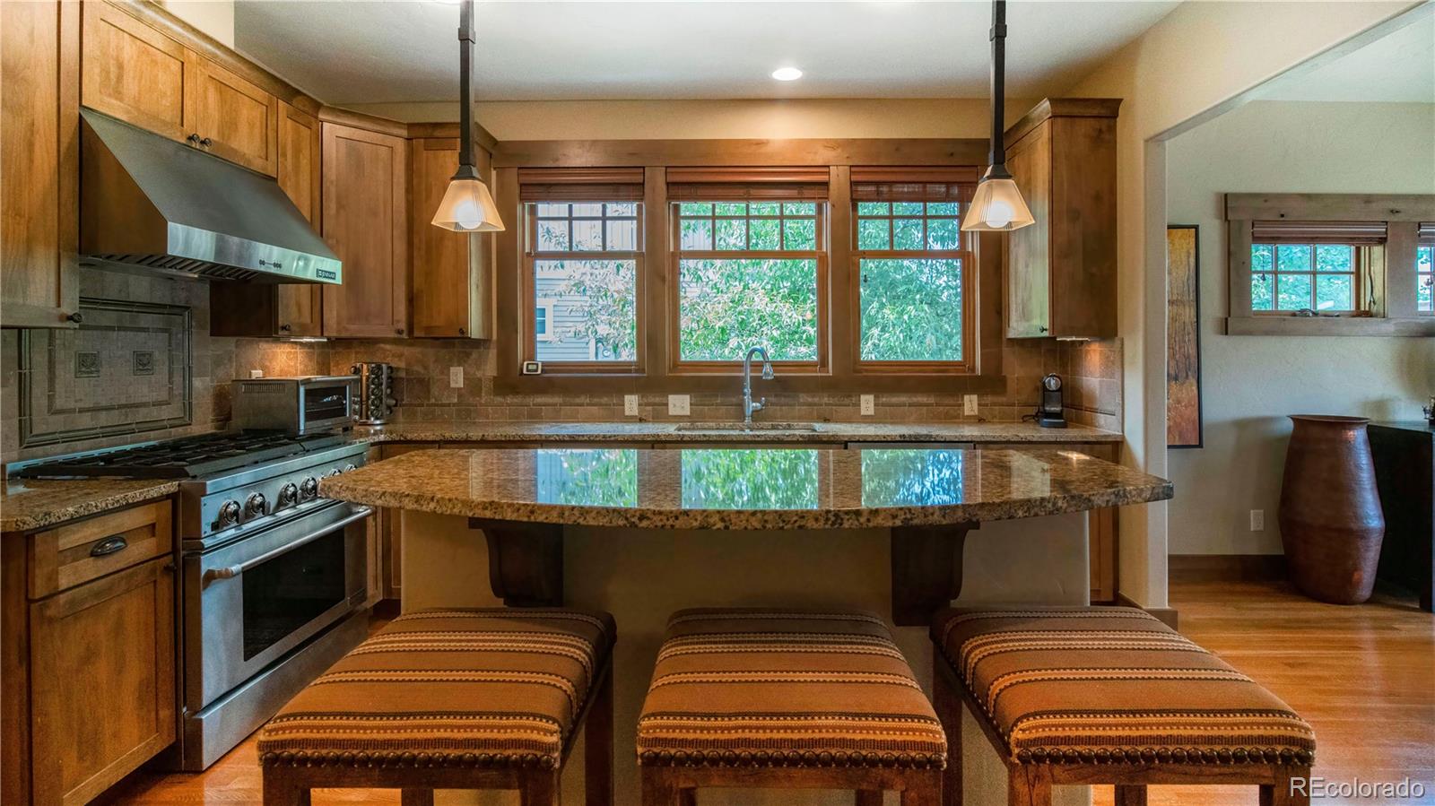 21 Meadow Trail Fraser, CO 80442 - Photo 22 of 36 a kitchen with a sink and chairs