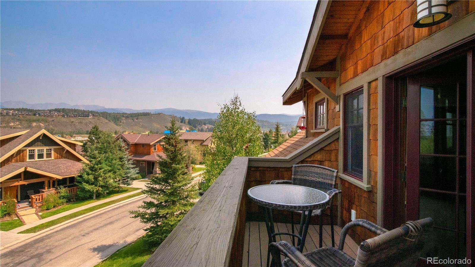 21 Meadow Trail Fraser, CO 80442 - Photo 6 of 36 a balcony view with couple of chairs