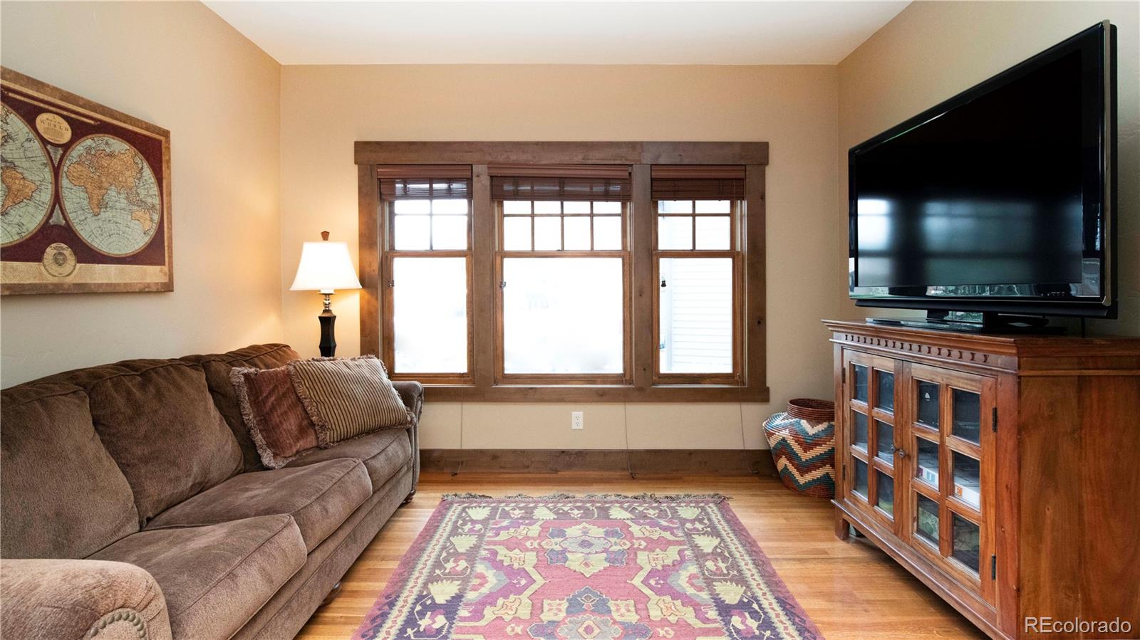 21 Meadow Trail Fraser, CO 80442 - Photo 10 of 36 a living room with furniture and a flat screen tv